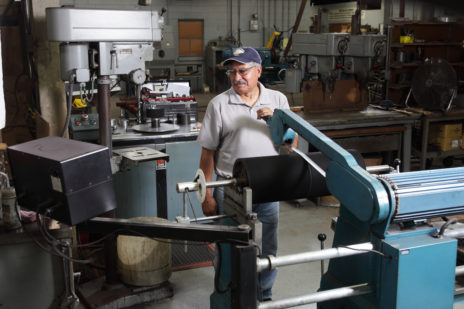 Ben at Contact Rubber using the balancing machine.